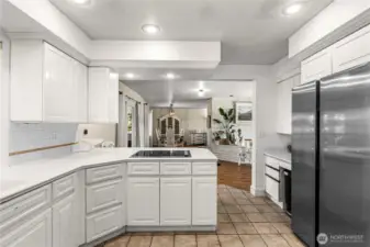 Kitchen with walk in pantry looking toward dining area. Views of the foothills