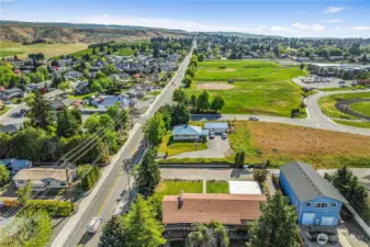 Open 1/2 acre in town with drive through auto accessibility