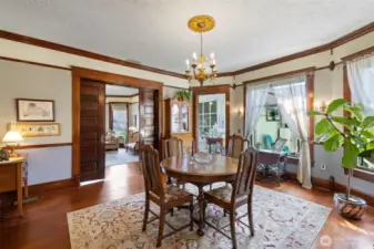 Formal dining room with entry to the sunroom.