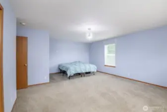 Primary bedroom with large with room for a sitting area too.