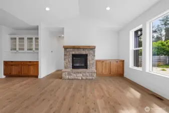 Imagine snuggling in in front of this cosy rock fire place in the living area
