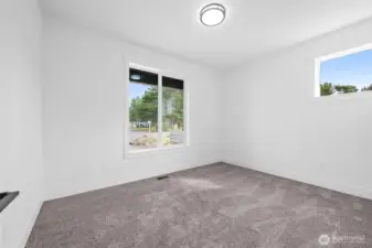 1 of 2 guest rooms separated from the living and primary bedroom