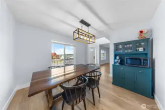 Dining room has plenty of space for a hutch or sideboard.