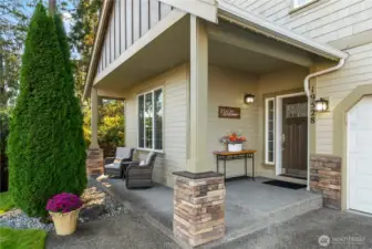 Welcome your guests from this beautiful mission style door with dentil shelf & beveled glass. The columns & front offer stone accents