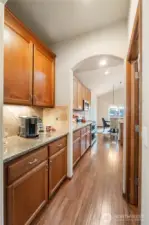The butlers pantry sits off the dining room and kitchen & creates the perfect coffee or wine bar plus lots of added storage. The generous walk-in panty sits to the right