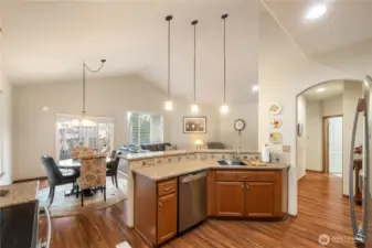 The inlaid stainless sink and garbage disposal have been updated along with most of the lighting. Enjoy the ample cupboard & counter space for cooking and entertaining. The open concept floor plan is spacious and light