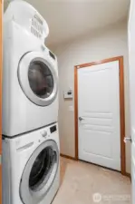 The laundry room sits off the hallway and leads to the garage. The home has a security system with interior sensors