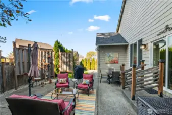 Another view of the outdoor living space. A great spot for a BBQ or relaxing by a fire