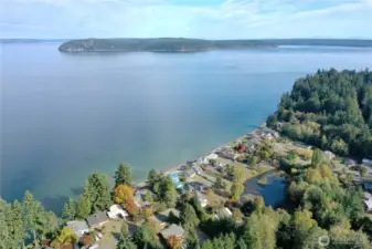 property has a legal access to the hood canal shoreline. Maintained path to the beach is right down the street.
