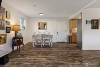 See the flow from kitchen to dining to living room.