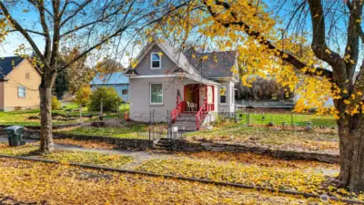 Nice paved road and sidewalk with curbside garbage service available.
