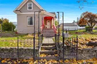 Pull up to property with wrought iron decorative entry.
