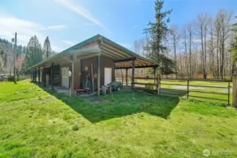 Barn and pasture setup with multiple paddocks for equestrian use