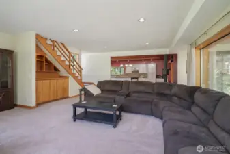 Living area with open flow and large windows