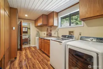 Laundry room with additional storage
