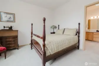 Primary bedroom with ensuite bathroom.