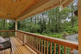 Covered front porch is a perfect place to sit and enjoy the views, and the quiet.
