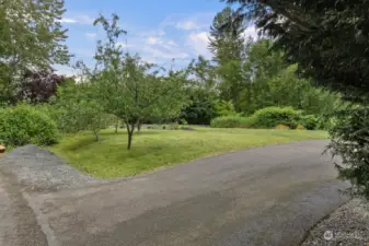 Big driveway with room for extra vehicles or RV parking.
