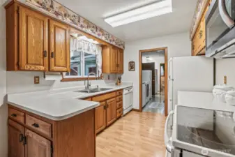 Kitchen looking into laundry room /garage access