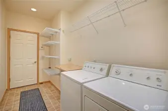 Dedicated laundry room with extra storage