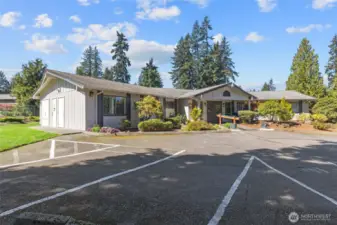 Community clubhouse with basketball court and pool