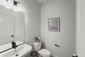 Picture of previously completed home in the same community. For illustrational purposes only. Actual plans and specs may vary. Some features shown are upgrades.