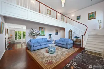 The sweeping staircase offers a truly grand entrance