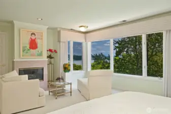 The primary is a genuine & gracious retreat with it's own fireplace and private deck.