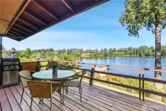 Enjoy the lake views from the covered deck.