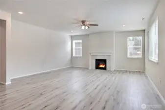 Large great room with gas fireplace.