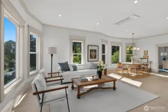 Spacious main floor living & dining area. Tall ceilings, recessed mini-split heating/cool unit.