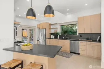Well appointed kitchen with great light and easy access to backyard.
