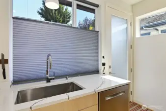 Chef's kitchen with high end appliances. Door right out to your parking space.