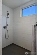 Top level primary with walk-in closet and spa-like bath.