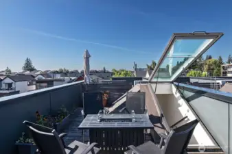 Rooptop deck with cozy firepit and territorial views.