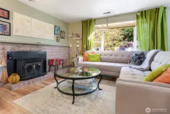 Wood burning fireplace with insert for cozy winter nights! This home also has a newer high efficiency heat pump and AC! Great for all seasons!