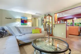 Living room opens into the kitchen.