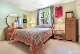 Primary bedroom overlooks the private back deck.