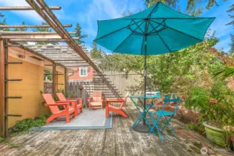 There is a raised deck in the backyard.  Just one more cool spot to relax and enjoy this urban oasis!