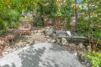 The private stone patio is a great place to read or reflex while enjoying the sound of the waterfall.