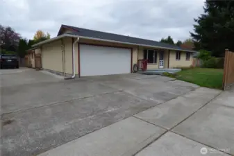 Parking galore! Double garage and entire side of house is paved. Great for rv, boat, ect.