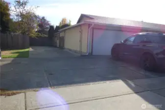 Long driveway along side of home.