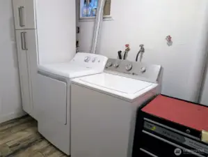 Laundry room w/ storage space