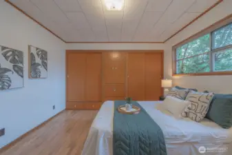 Second bedroom is also oversized and has built-in cabinets and large window to brighten even the gloomiest day!