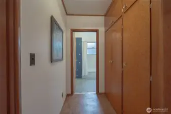 More custom built-in cabinets in hallway--storage galore!