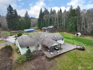 Mostly level yard  with an outbuilding and trees bordering for privacy...this is the end of the road and sellers have enjoyed the peace and quiet along with their ability to entertain guests!