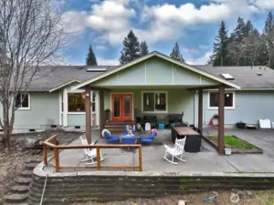 Spacious patio with covered area just off the living room.
