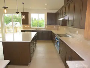 Wood cabinetry with under counter lighting.