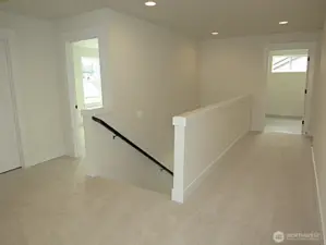 Landing with laundry at the end.