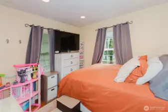 Bedroom #1 with nice can lighting. The room will accommodate a king bed.